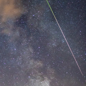 Perseid meteor crosses the mil...